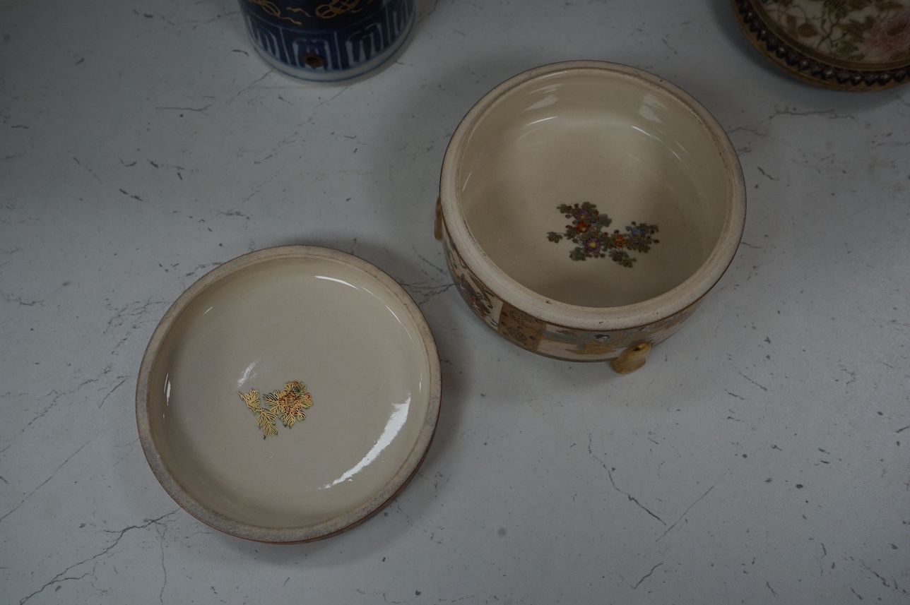 A Japanese Satsuma circular box and cover, a similar vase and an Imari sleeve vase, largest 30cm high. Condition - sleeve vase cracked, others good